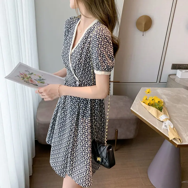 

Large women's summer floral dress with thin V-neck skirt