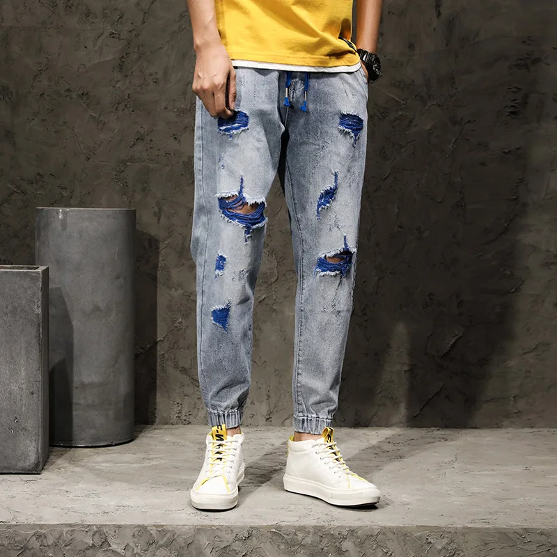 

Jeans male 2020 summer thin han edition men leisure harlan bound feet hole chao pai gow points of trousers