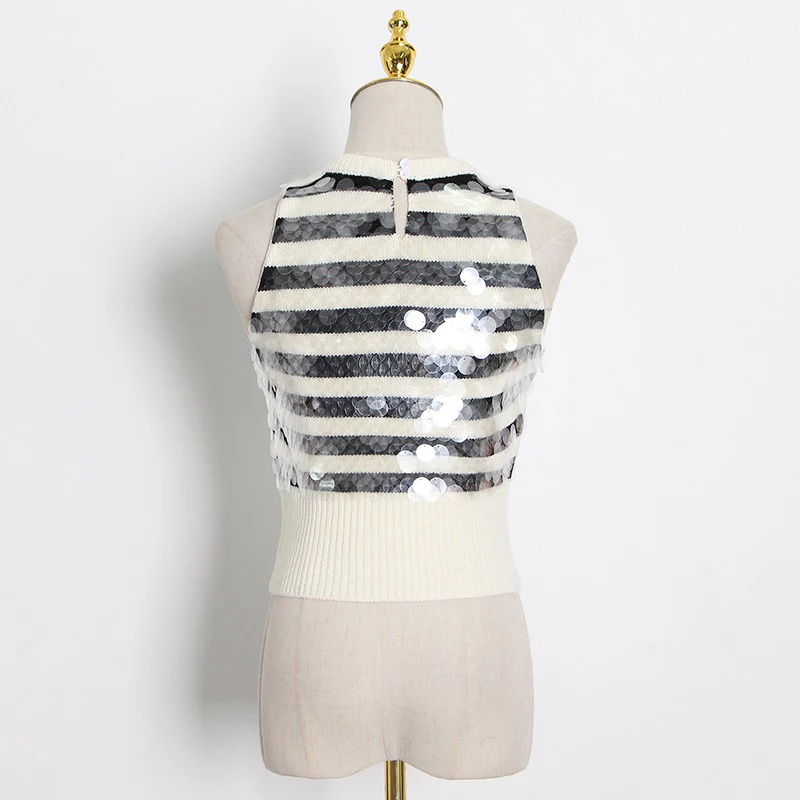 

Женский трикотажный жилет с блестками и круглым вырезом