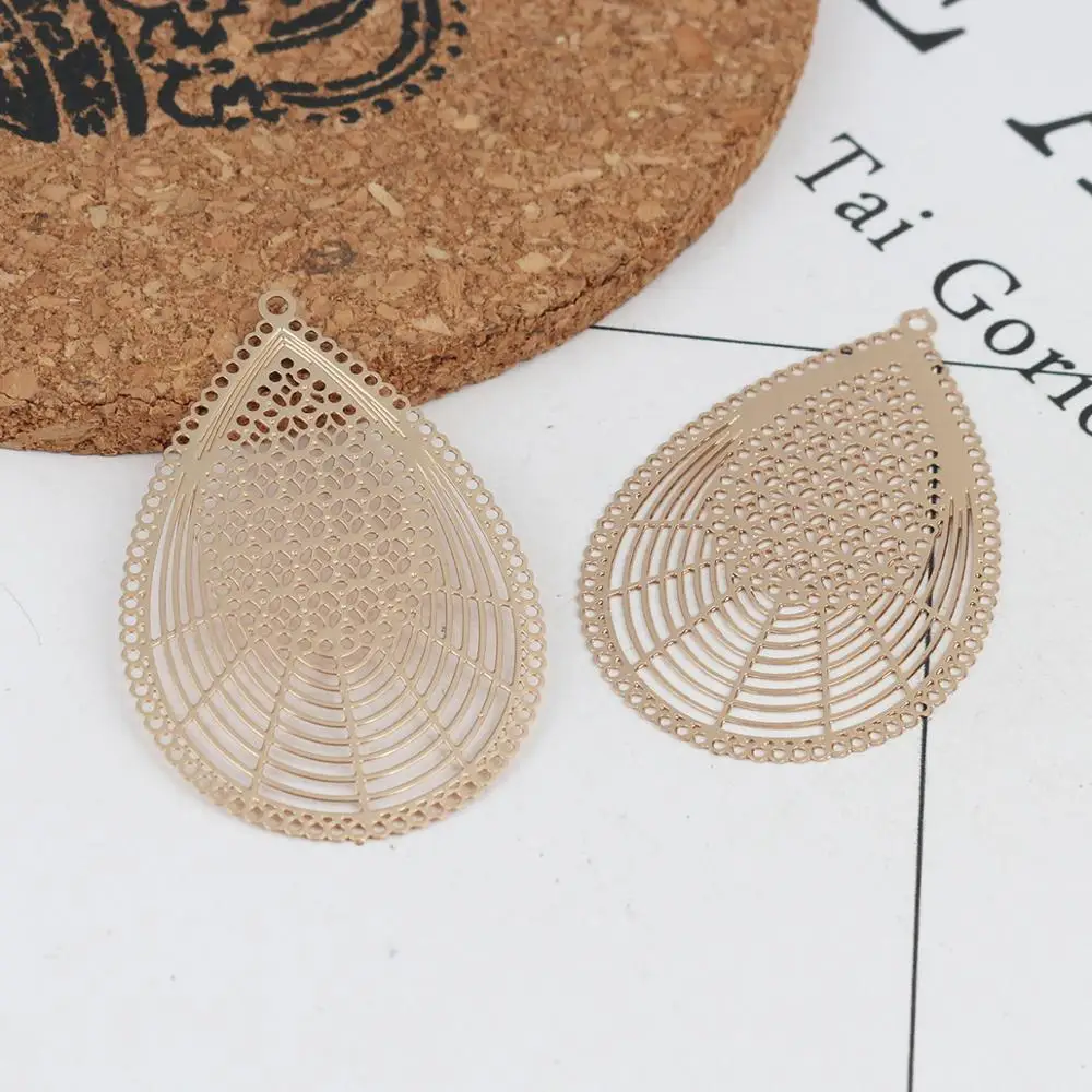 

DoreenBeads Fashion Copper Filigree Stamping Pendants Gold Silver Color Drop Charms Jewelry DIY Findings 4.2cm x 2.7cm, 10 PCs