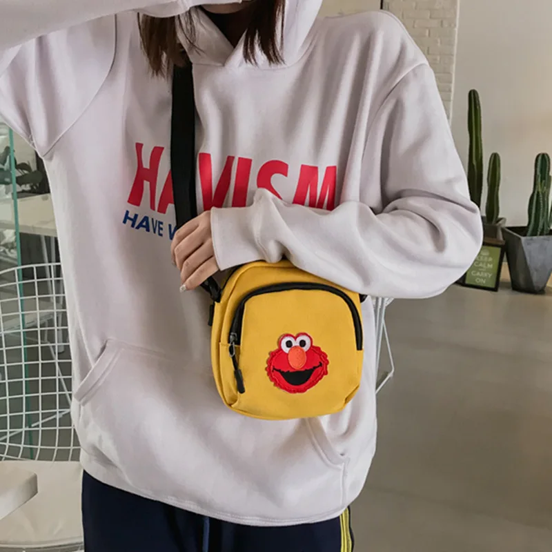 

2020 new small bag female tide Korean version ins super fire girl messenger shoulder bag casual canvas funny bag 11