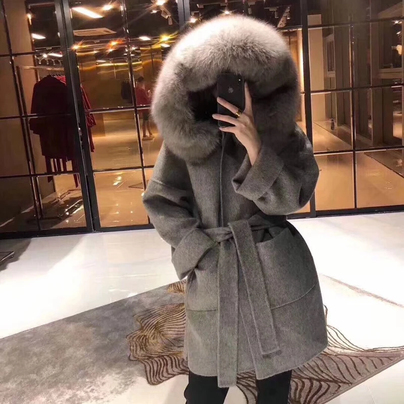 

Женское кашемировое пальто, двухстороннее шерстяное пальто с большим воротником из лисьего меха, длинная кашемировая верхняя одежда с капю...