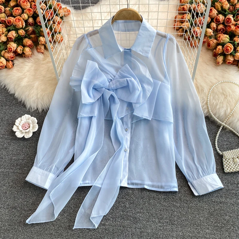 

Женская однобортная рубашка-поло с длинным рукавом и буффами на рукавах