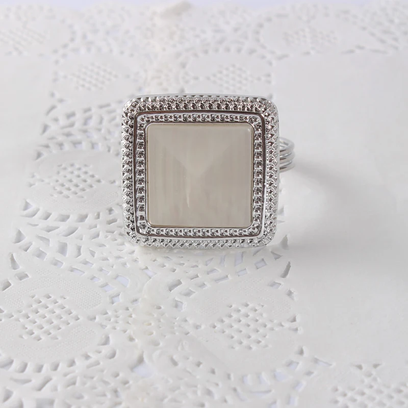 

Modern Wedding Accents Shiny Silver Plating with Square Shape White Mother of Pearl Framed Alloy Napkin Rings Set of 12 Pieces