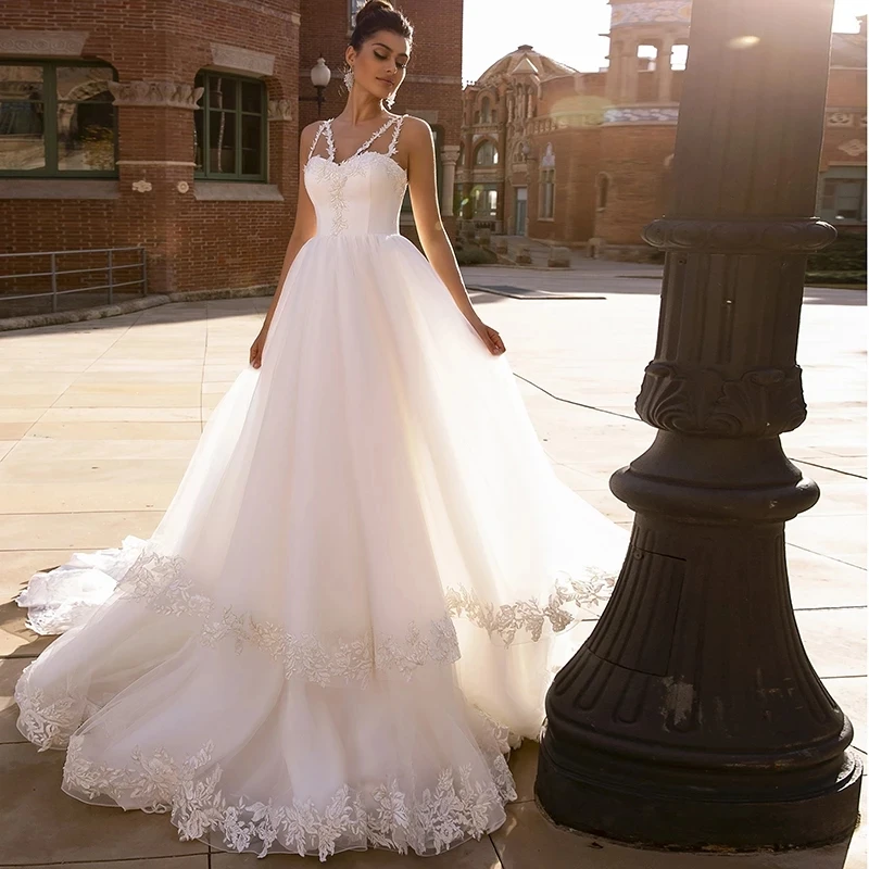 

Spaghetti Straps Beach Wedding Dress Famous A Line Appliques Ruffles Sweep Train Bridal Gown robe de soirée de mariage