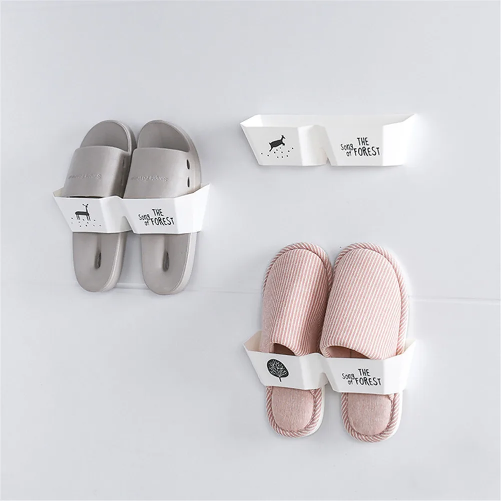 

Wall-mounted seamless adhesive shoe rack household simple shoe storage household bathroom shower wall storage shoe rack