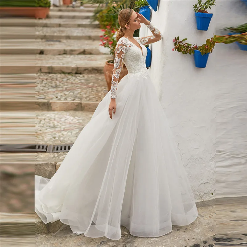

Deep V-Neck Long Sleeves Wedding Dresses with Lace Appliques Buttons Back Tulle Boho Bridal Gowns Wedding Garden Bride Dress