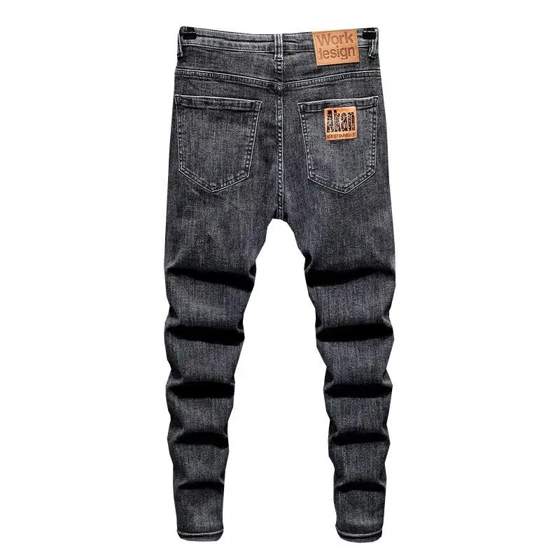 

Серые джинсы мужские летние однотонные Стрейчевые повседневные длинные брюки в Корейском стиле Молодежные