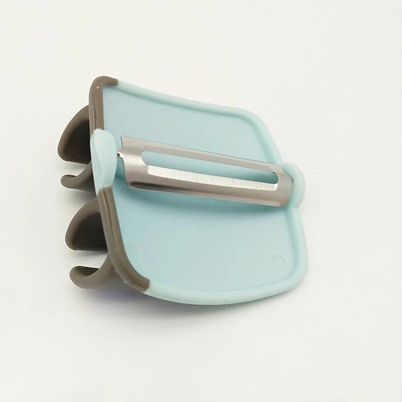 Новые творческие палец провел ладони очистки фруктов и овощей легко держать