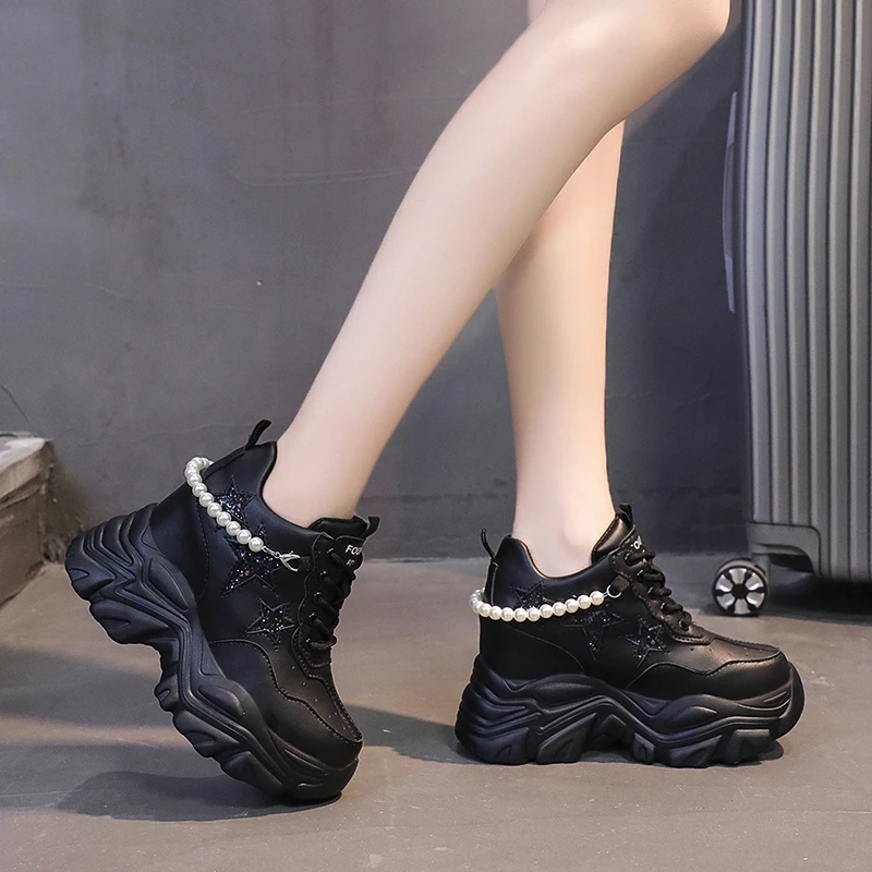 Женские кожаные кроссовки на высокой платформе