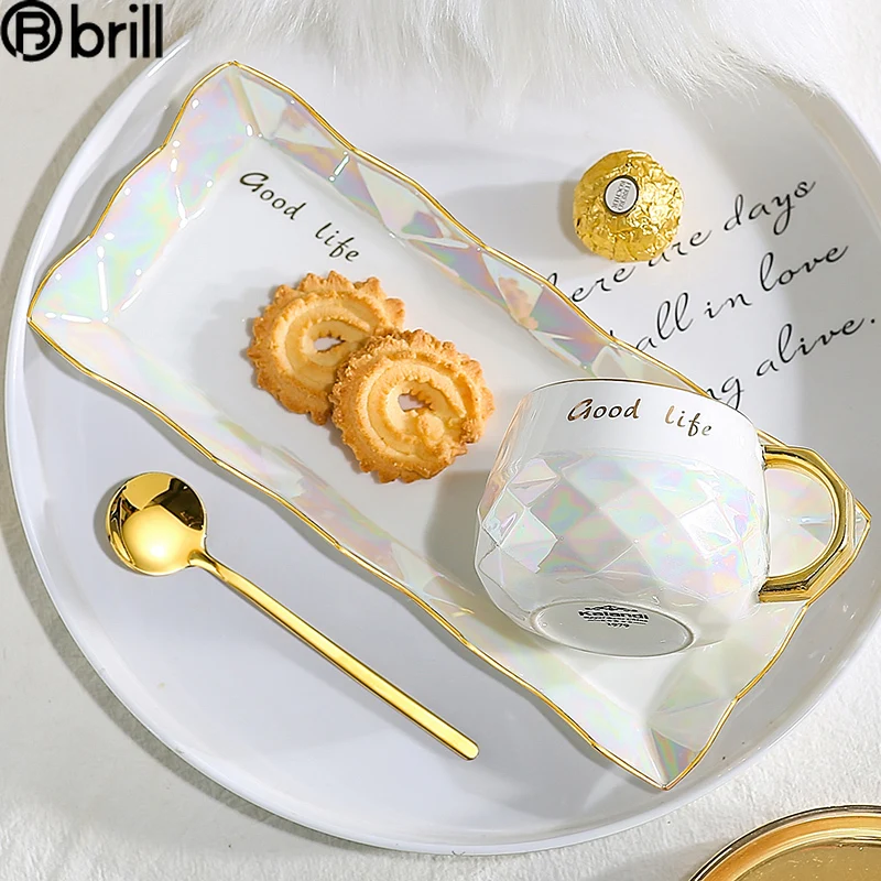 

Luxury Nordic Ceramic Cup with Spoon Simple White with Handle Office Afternoon Tea Cups and Saucer Sets Tazas De Cafe Creativas