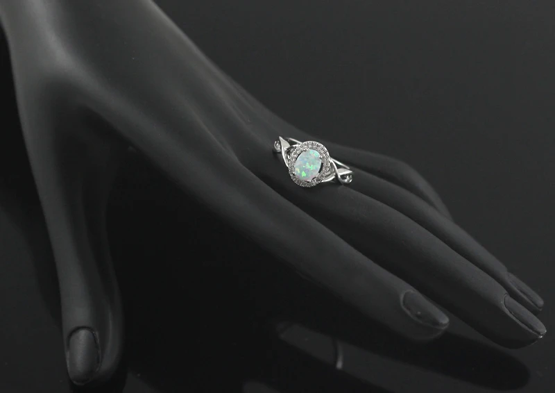 

Wholesale Retail Oval White Fire Opal CZ Inlay Women Rings Size 6 7 8 9 64W