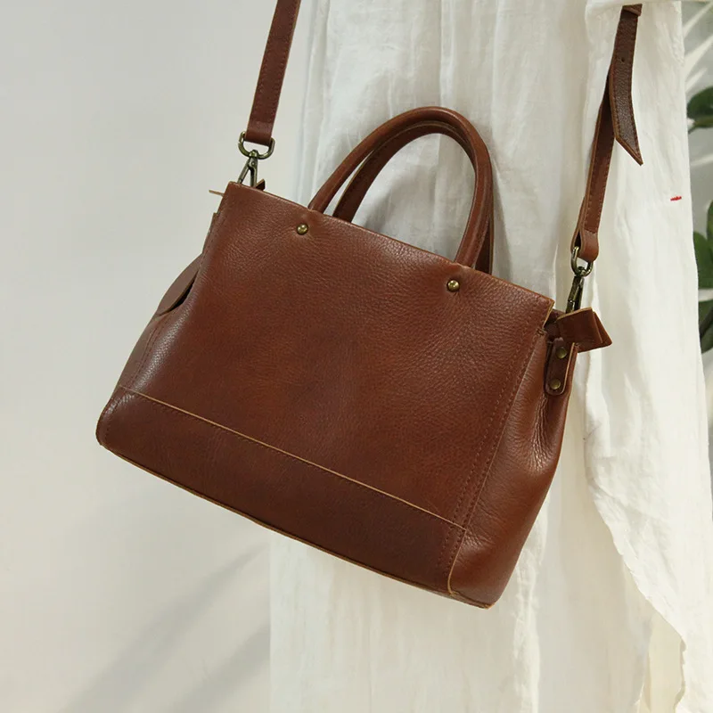 

2021 New top leather, art retro rivet Handbag, three zipper bag