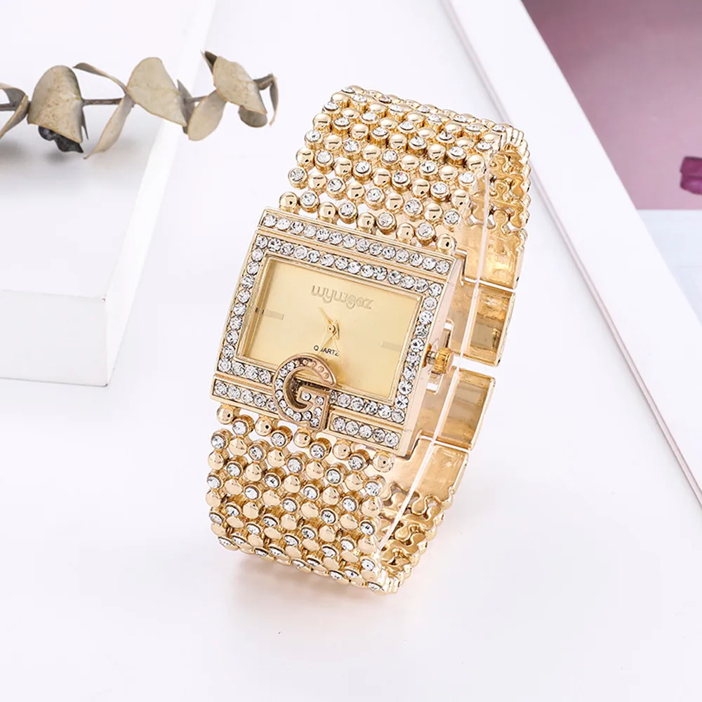 

2020 luxus marke casual uhr damen runde voller diamant armband analog uhr quarz bewegung uhr direkte lieferung