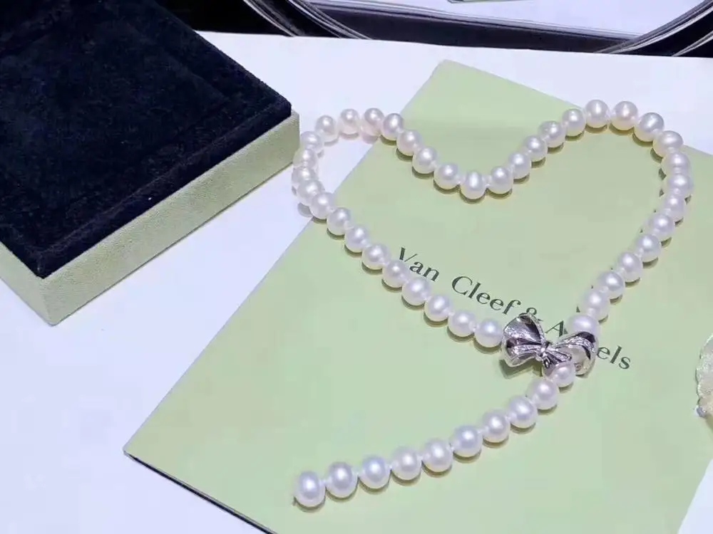 

Hot sell 50-51cm 8-9mm white freshwater pearl butterfly micro inlay zircon necklace fashion jewelry
