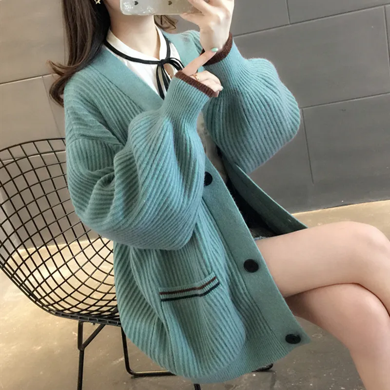 

2021 lazy style new mid-length knitted cardigan female Korean version loose solid color lantern sleeve sweater jacket trend