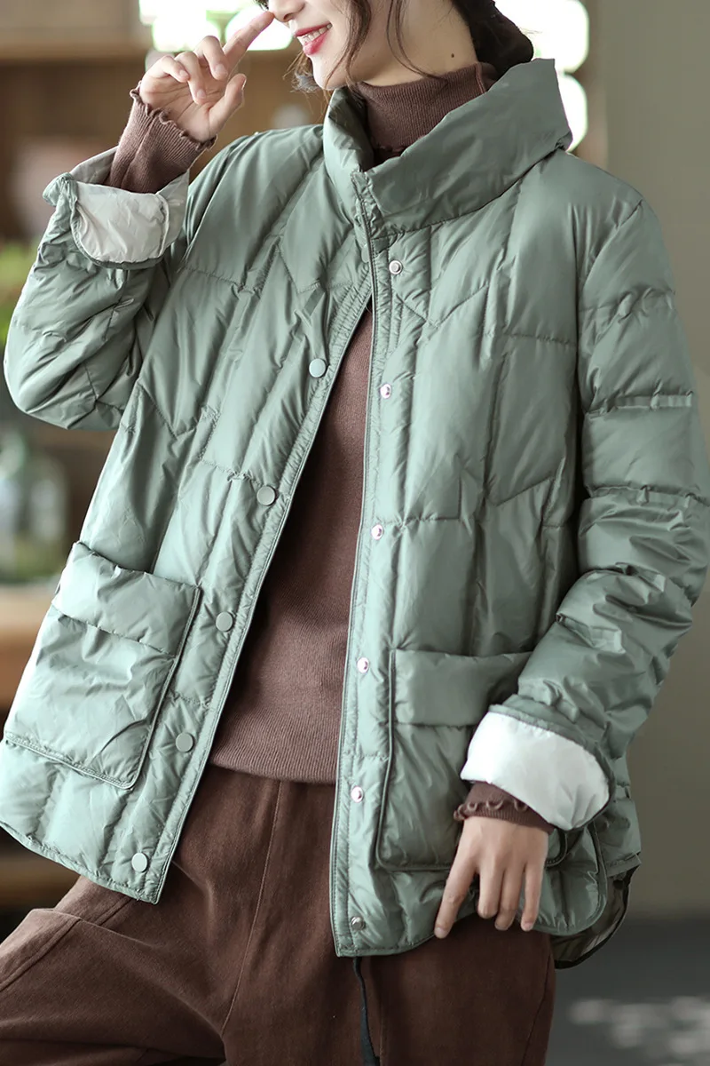

2021 winter dark pattern printing fashionable white duck down jacket loose hooded thin sweater style down jacket women