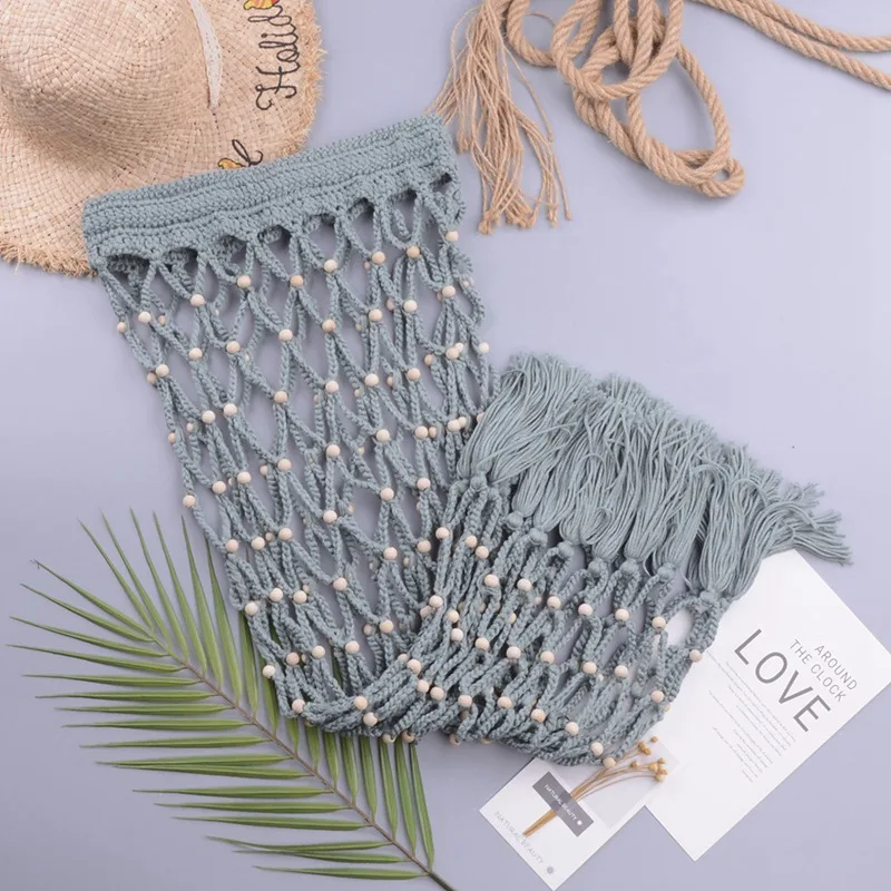 

Women Beach Skirt Crochet Beach Cover Up Fishnet Swimsuit Coverup Hollow Out Beads Beachwear Tassels Bikini Cover Up 2021 New