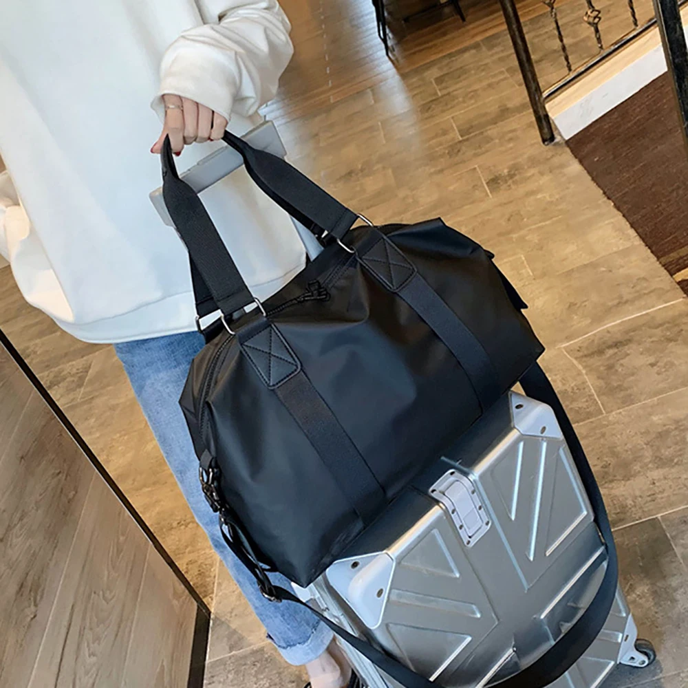 저렴한 내구성 방수 나일론 패브릭 여행 가방 휴대용 체육관 가방 다기능 접는 짐 가방 대형 단거리 여행 가방