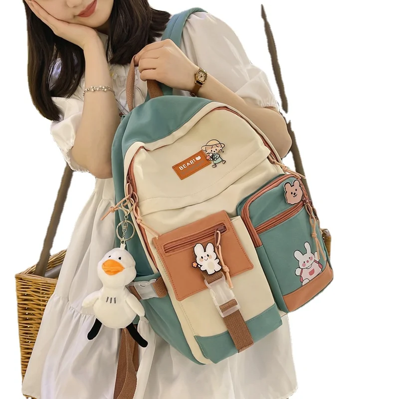 

2021 New Badge Buckle Backpack Women Waterproof Color Patchwork Backpacks For Teenage Girl School Bag Fancy Student Book Bag