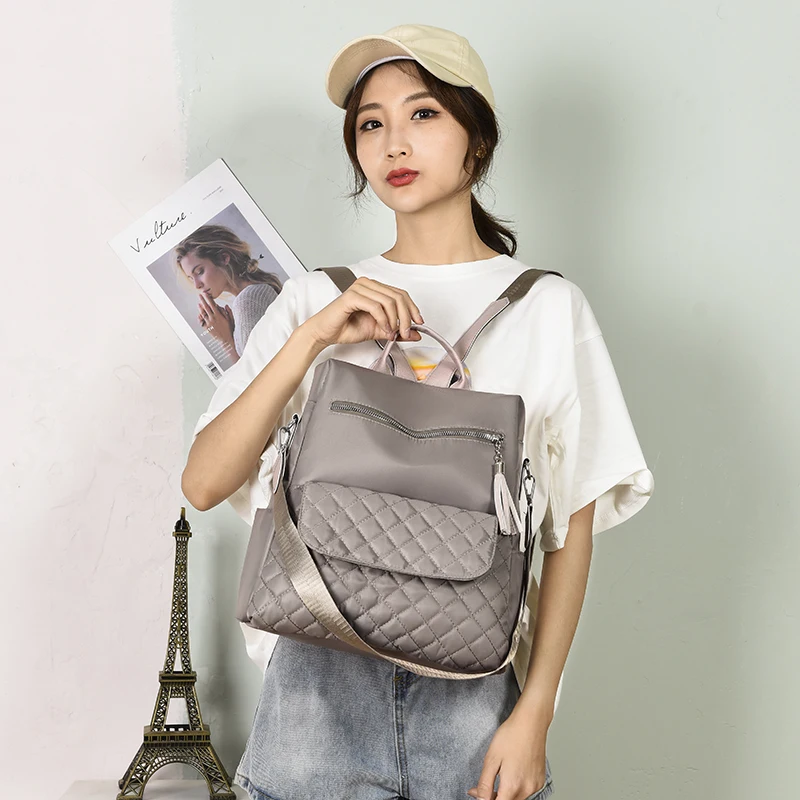 

LU.FAWN Ladies' New Style Rhombus Line Fashion Casual Backpack Trendy Tassel Zipper Large Capacity Multiple Pockets1234