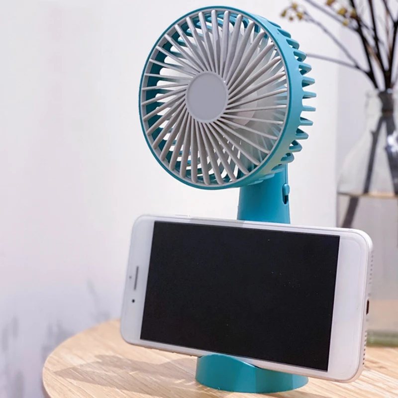 

USB Portable Handheld Fan With Phone Holder Practical and durable simple small fan summer new home must-have rechargeable fan