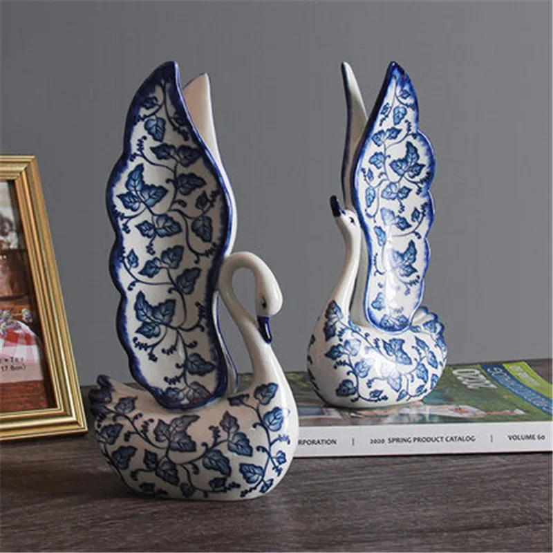 

WU CHEN LONG Creative Blue And White Porcelain Swan Statue Home Decor Living Room TV Cabinet Crafts Sculpture Ornaments A2516
