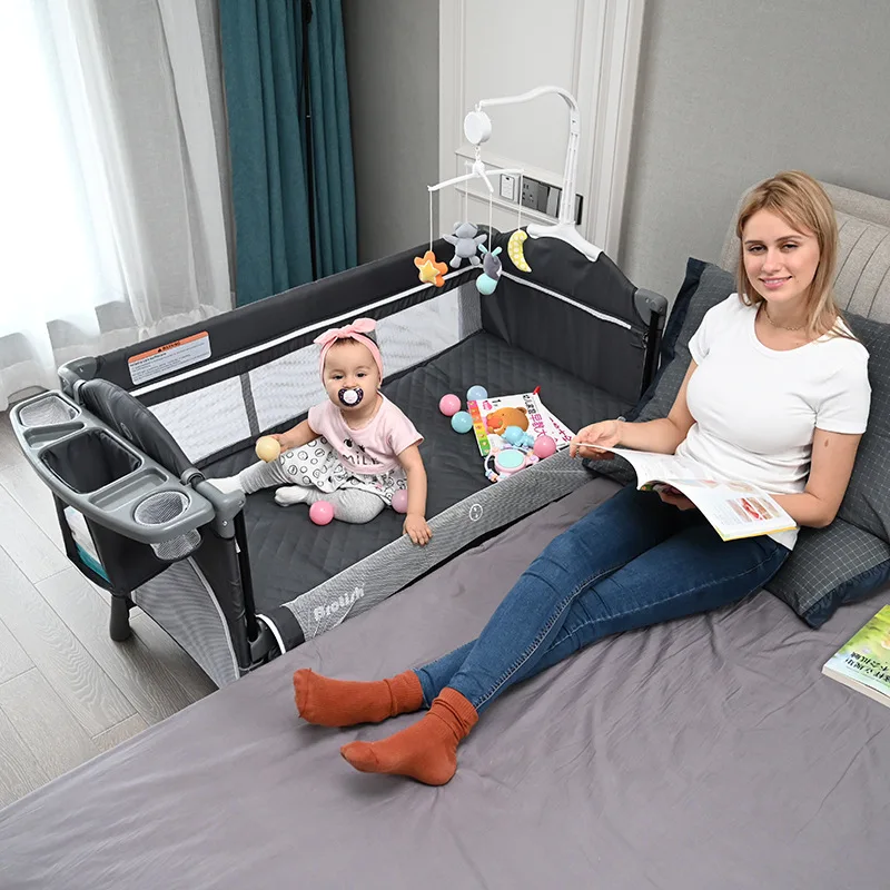 

Multifunctional Foldable Crib Splicing Large Bed Removable Baby Bedside Bed Cradle With Bed Diaper Table and Toy Stand