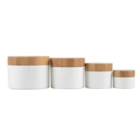 eco friendly cosmetic containers plastic cream jars white pp luxury jar with bamboo lids 10g 20g 30g 50g 100g face cream
