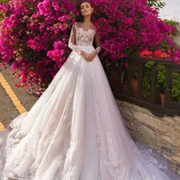 o neck appliques wedding dresses lace flowers court train a line long sleeves illusion back hem lace vestidos de novia
