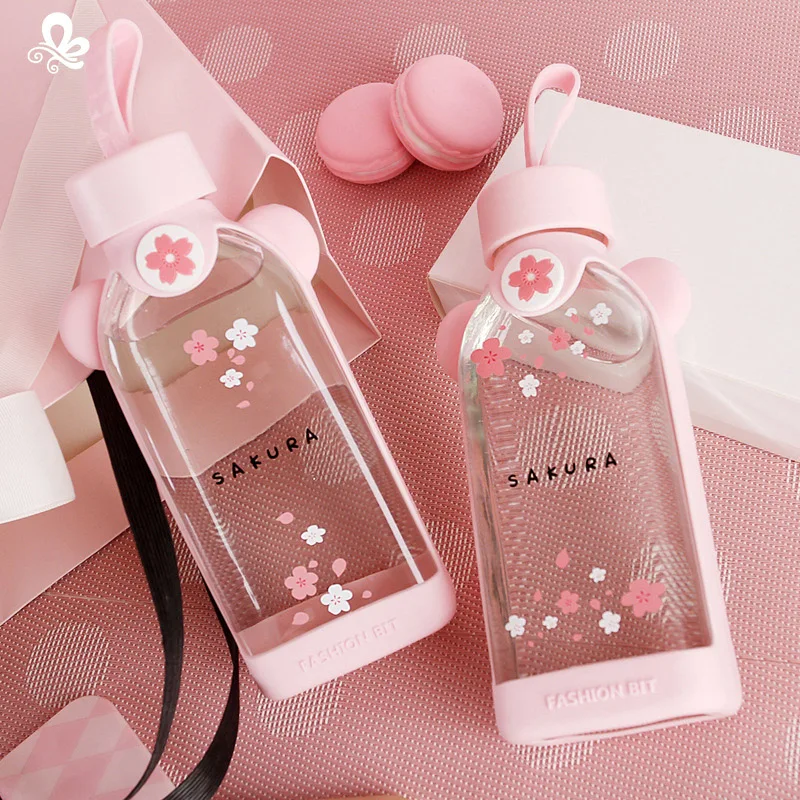 

New Cute Glass Bottle Creative Cartoon Pink Cherry Blossom Glass Water Cup With Silicone Cover For Women Girl Drink Bottles