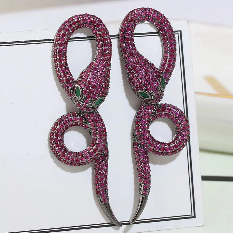 

European and American creative coiled snake earrings inlaid with zircon luxury color earrings domineering hipster earrings