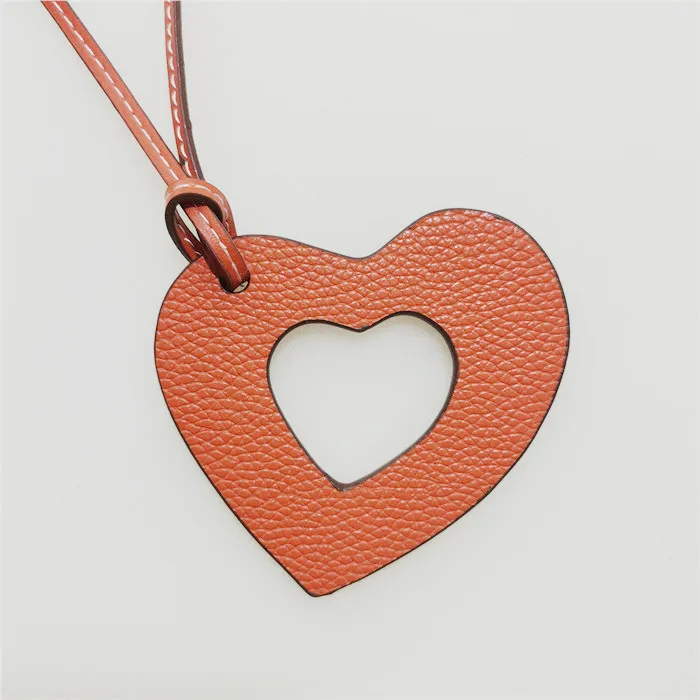 

Брелок ручной работы известного бренда из натуральной искусственной кожи с одним лицом, брелок с кулоном «любовь» для женщин, очаровательн...