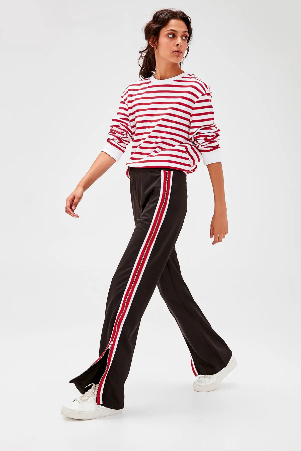 Черные трикотажные спортивные штаны с молнией и полосками Trendyol TWOAW20EA0081|Беговые