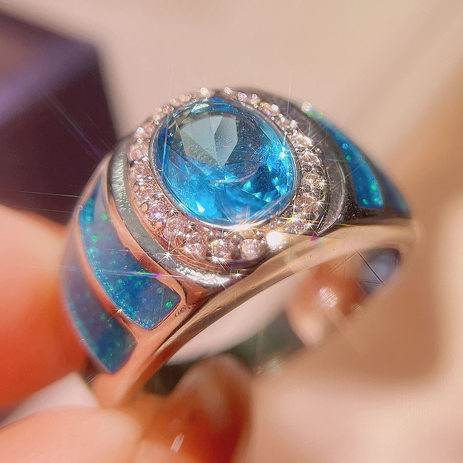 

Luxury S925 Oval Ring Zircon Blue Stone Engagement Wedding Band Plata Filled Jewelry For Women Men Wholesale Drop Shipping
