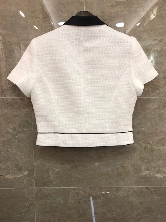 

2021 spring and summer new women's Lapel symmetrical pocket decorative button short sleeve versatile top 315