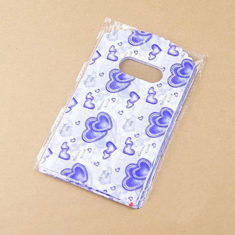 

100pcs/lot New Cute Lovely Heart Print Plastic Gift BagWholesale Packaging Bags Shopping Bag Organizers 14X9CM