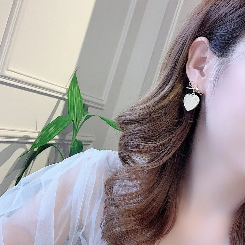 

Fashion popular bowknot earrings asymmetric cloth art peach heart earrings jewelry accessories