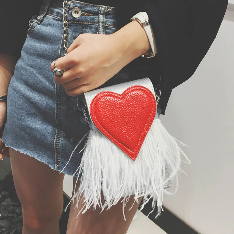 

Новый дизайн, модные женские сумки-тоуты из искусственной кожи в форме перьев в форме сердца для вечеринки, повседневная женская сумочка на ...