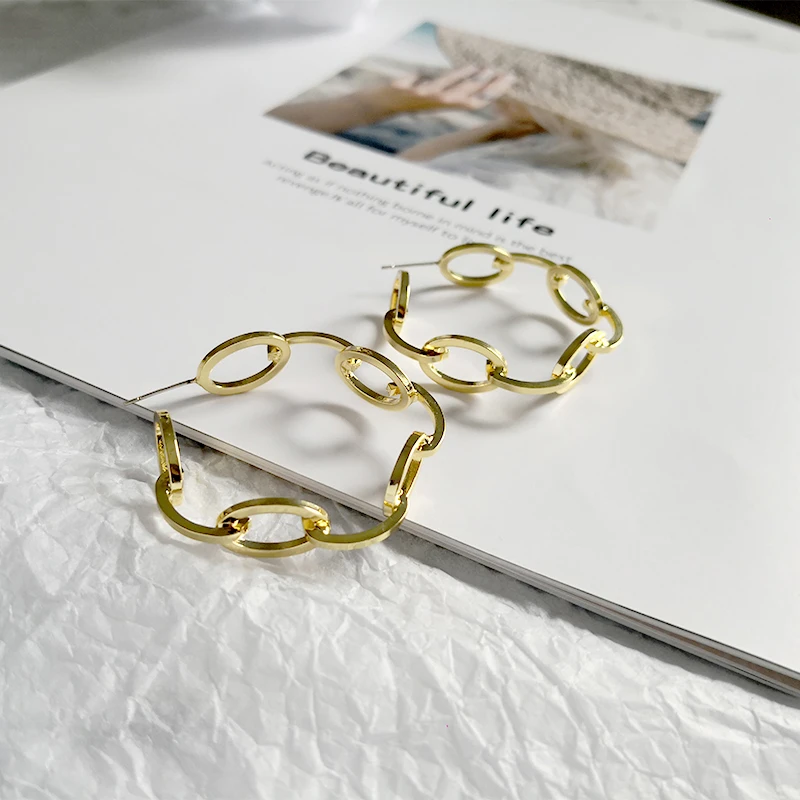 Крупные золотистые серьги-кольца GHIDBK Hyperbole минималистичные большие полые