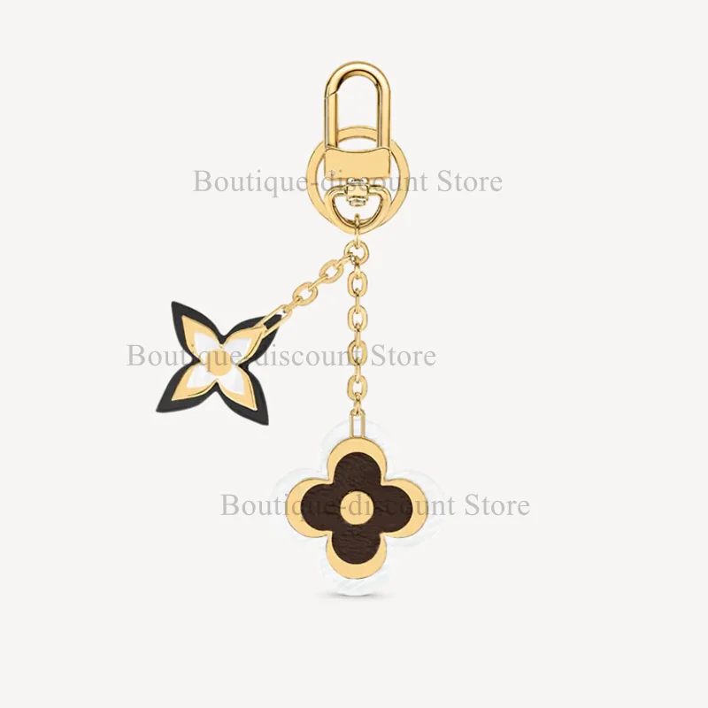 

M63085 M69566 Роскошный брелок с подвеской в виде четырехлистного клевера подсолнуха высококачественный L бренд старый цветок сумка Аксессуары П...