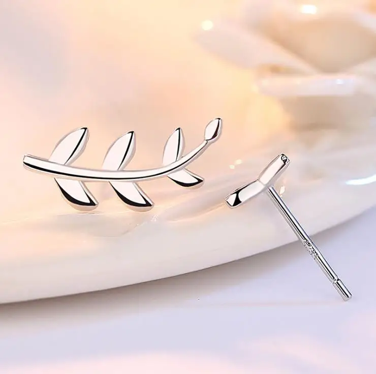 Асимметричные серьги-гвоздики с листьями дерева серебро 925 пробы | Украшения и