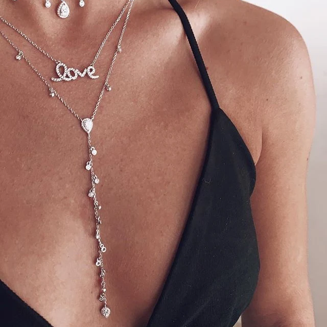 Женское длинное ожерелье с фианитами золотистое модное привлекательное длинной