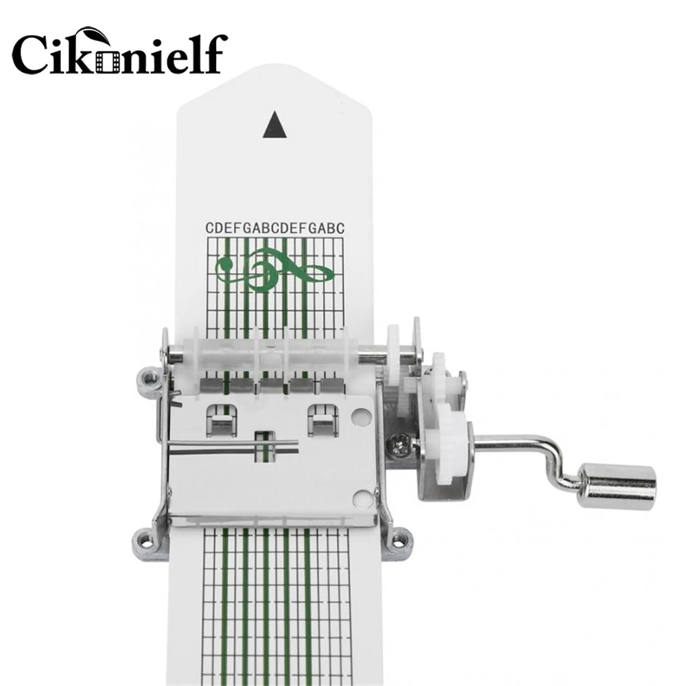 Музыкальная шкатулка с ручным приводом дыроколом и бумажными лентами сделай сам