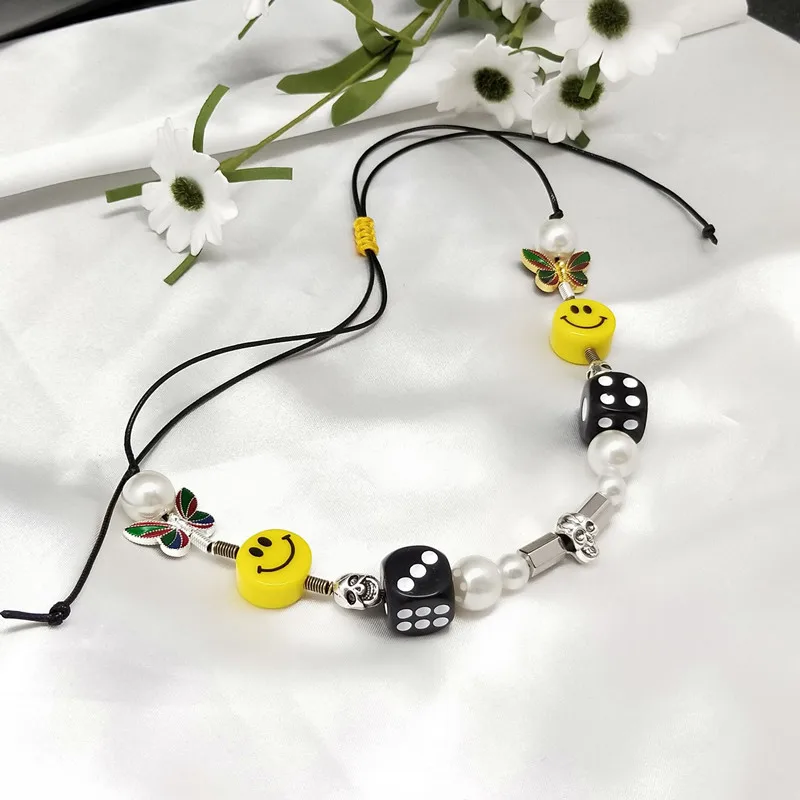 

Wu Yifan ASAP Rocky Same Tide Dice Skull Butterfly Pearl Ceramic Smiley Face evae Necklace
