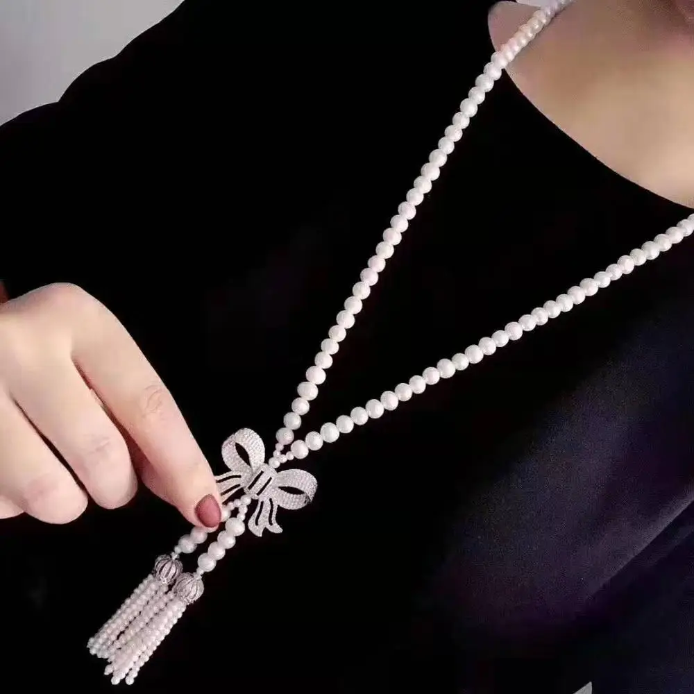 

Women's fashion jewelry micro inlaid zircon bow accessories 3-4-5-6-7-8-9mm freshwater pearl tassel pendant necklace