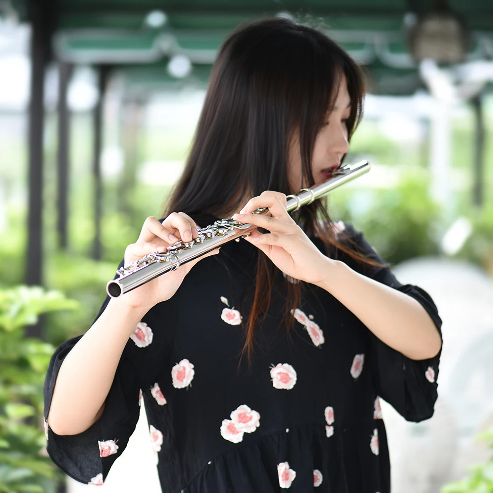 

Muslady Western Concert Flute Silver Plated 16 Holes C Key Cupronickel Woodwind Instrument with Cleaning Cloth Stick Gloves