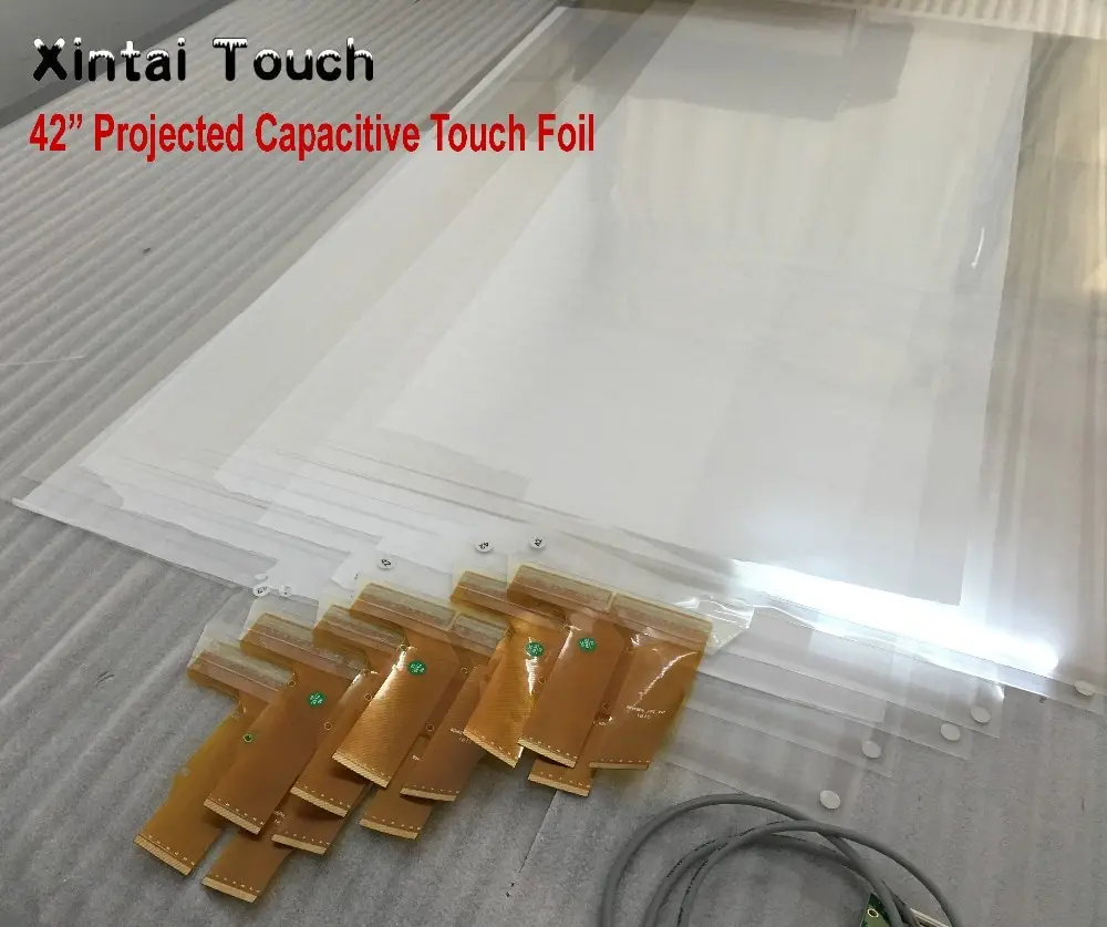 

Xintai Touch 42 inches Interactive Touch Foil,multi 20 points interactive touch foil film,touch film side tail