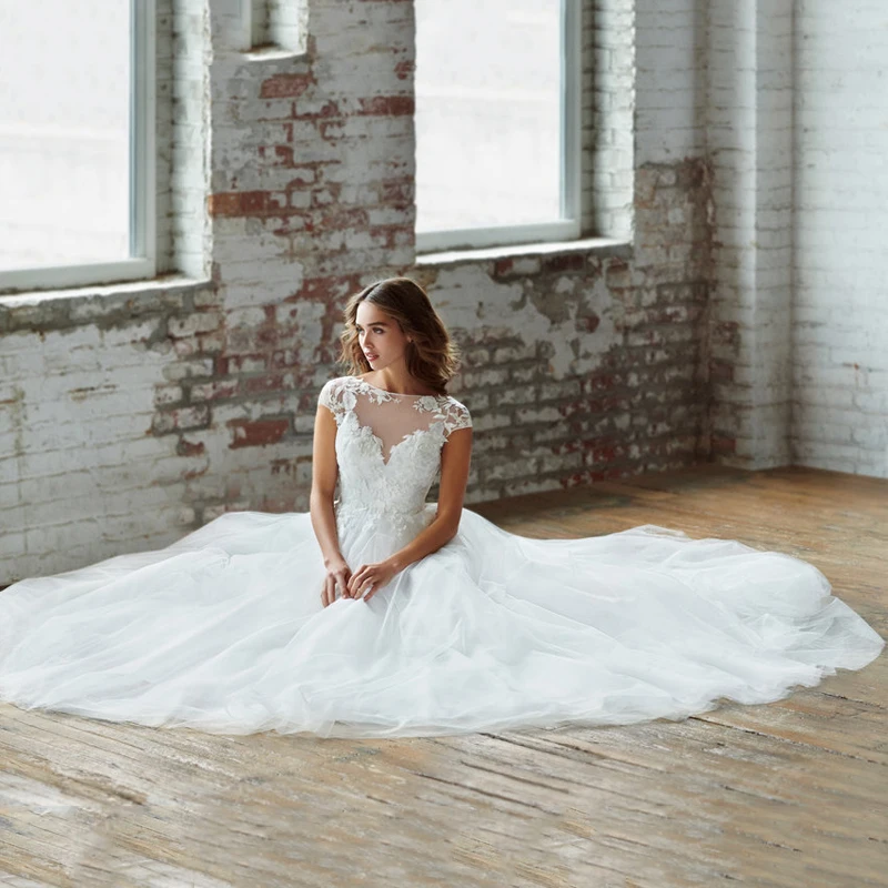 

Eightree Simple White Long Wedding Dress Summer Boho Lace Applique Cap Sleeve Bridal Dress A-Line Backless Wedding Princess Gown