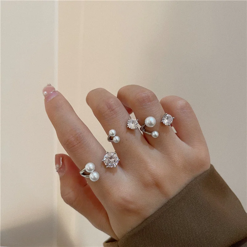 

ALLNEWME Charming Shiny CZ Stone Charm Rings for Women Delicate Imitation Pearls Open Adjusting Ring Statement French Jewelry